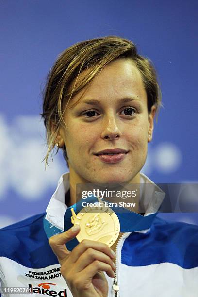 Federica Pellegrini of Italy poses with her gold medal in the Women's 200m Freestyle Final during Day Twelve of the 14th FINA World Championships at...