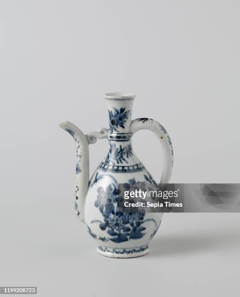 Ewer with flowering plants, flower sprays and floral scrolls, Porcelain jug with a pear-shaped body, c-shaped ear and curved spout attached to the...