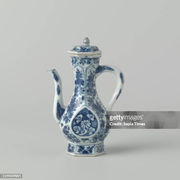 Hexagonal ewer with flowering plants and floral scrolls, Hexagonal jug made of porcelain with a pear-shaped body, long S-shaped spout and S-shaped...