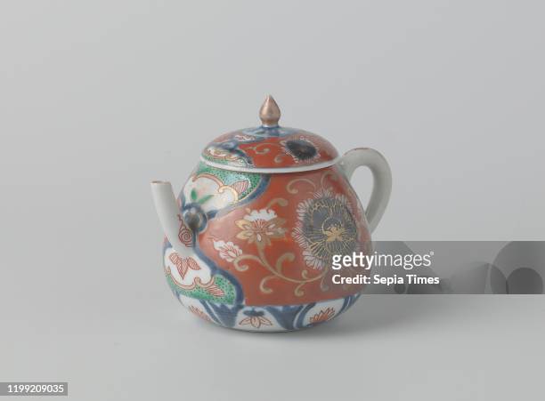 Teapot with lotus scrolls and flower roundels, Porcelain teapot with pear-shaped body, c-shaped ear and slightly curved spout, painted in underglaze...