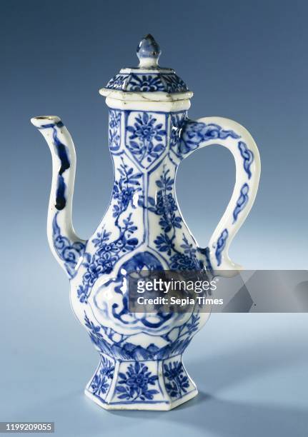 Hexagonal ewer with flowering plants and floral scrolls, Hexagonal can made of porcelain with a pear-shaped body, long, S-shaped spout and S-shaped...