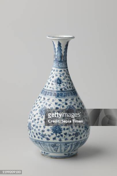 Pear-shaped bottle vase with continuous lotus scrolls and ornamental borders, Porcelain bottle-shaped vase with pear-shaped body and trumpet-shaped...