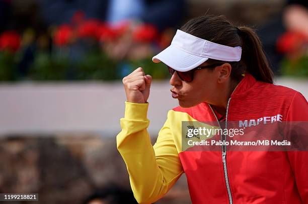 Anabel Medina of Spain celebrates as Naomi Osaka of Japan plays against Sara Sorribes Tormo of Spain during the Fed Cup qualifiers first round match...
