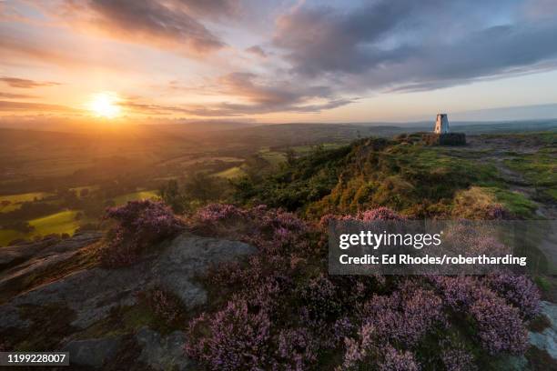 the survey point at cloudside with amazing sunrise in summer, congleton, cheshire, england, united kingdom, europe - sunbeam clouds stock pictures, royalty-free photos & images