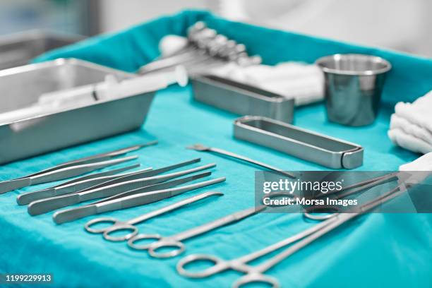 surgical instruments in operating room - surgical tray stock pictures, royalty-free photos & images