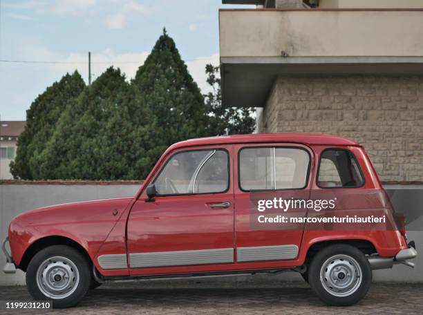 renault 4 classic french vintage car parked in italy - old renault stock pictures, royalty-free photos & images