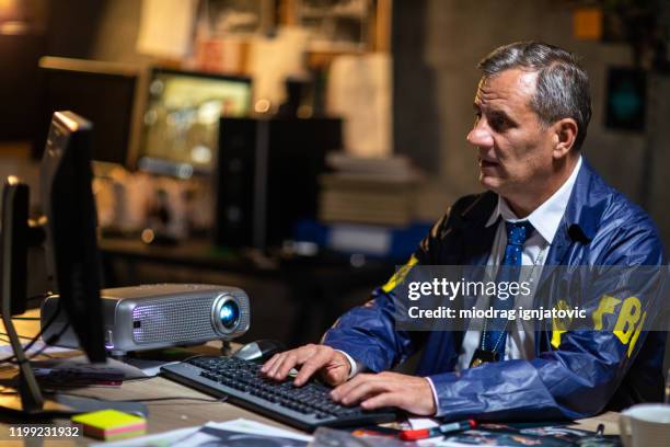 Fbi Typing At Computer Research Precinct Photos and Premium High Res Pictures - Getty Images