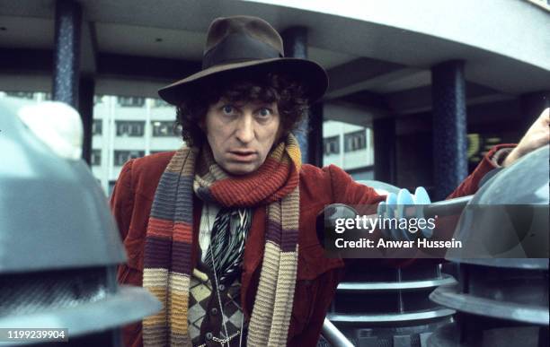 English actor Tom Baker in his role as the fourth incarnation of Doctor Who in the British science fiction television series of the same name, circa...