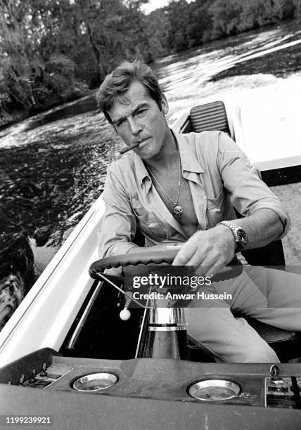 Roger Moore during the filming of the James Bond film 'Live and Let Die' on location in Jamaica on March 01, 1973 in Kingston, Jamaica.