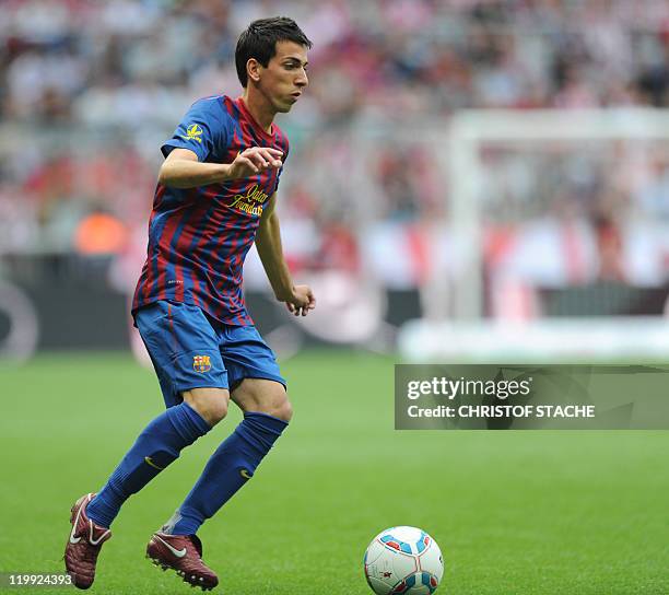 Barcelona's striker Juan Cuenca plays the ball during their Audi Cup football match FC Barcelona vs SC International de Porto Alegre in Munich,...