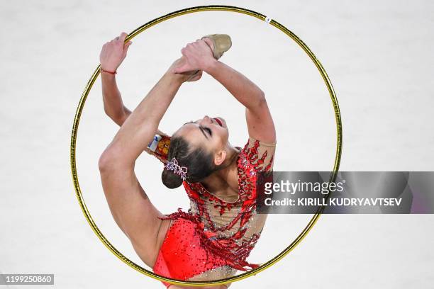 Russia's Arina Averina competes in the hoop event of the Rhythmic Gymnastics Alina Kabaeva Champions Cup in Moscow on February 7, 2020.