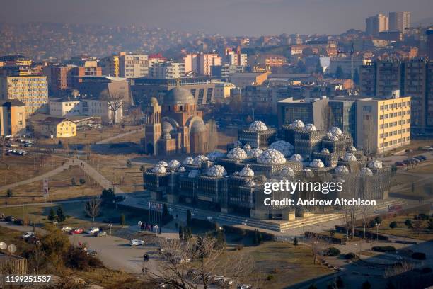 The Skyline of Pristina including the National Library of Kosovo PjetEr Bogdani and the incomplete Christ the Saviour Serbian Orthodox Cathedral, on...
