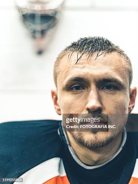 pro hockey goalie after the training - blank sports jersey stock pictures, royalty-free photos & images