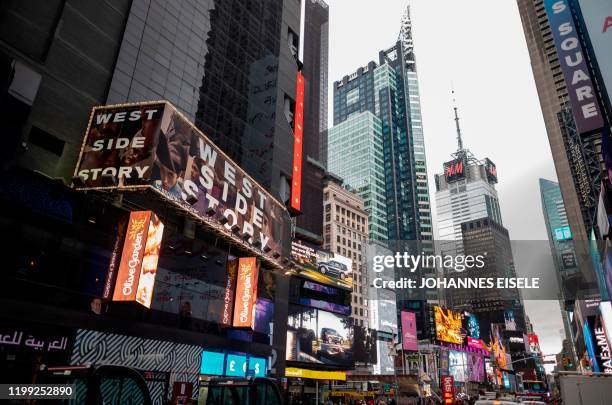 Poster on Times Square advertises West Side Story at the Broadway Theater on February 7, 2020 in New York City. - Westside Story is returning to...