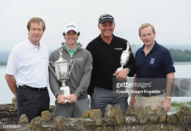 Left to right, George O'Grady, chief executive of the European Tour, Darren Clarke and Rory McIlroy of Northern Ireland and Taoiseach Enda Kenny at...