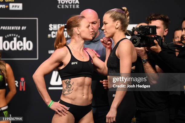 Valentina Shevchenko of Kyrgyzstan and Katlyn Chookagian face off during the UFC 247 ceremonial weigh-in at the Toyota Center on February 7, 2020 in...