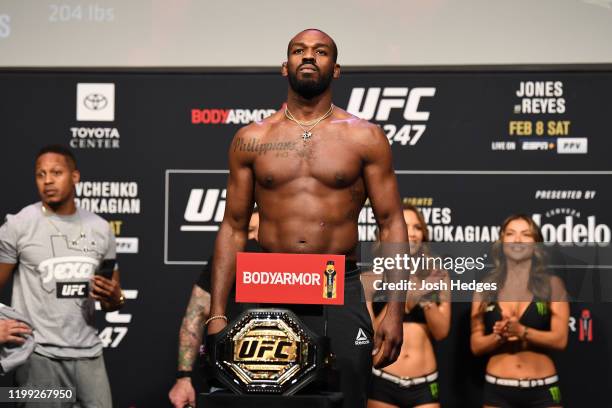 Jon Jones poses on the scale during the UFC 247 ceremonial weigh-in at the Toyota Center on February 7, 2020 in Houston, Texas.