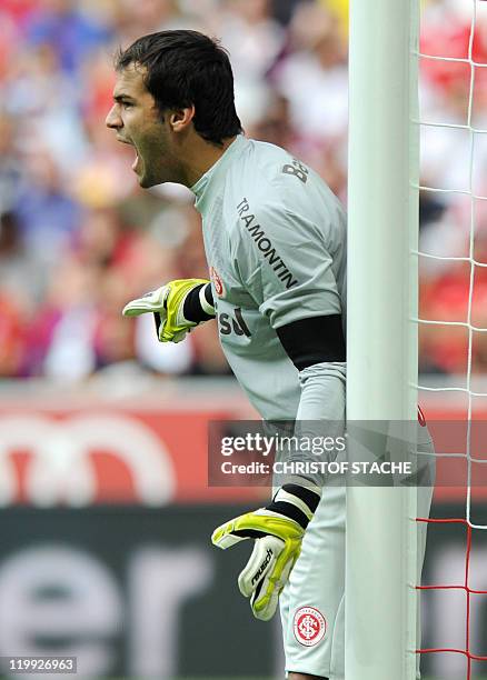 Porto Alegre's goalkeeper Muriel gestures during their Audi Cup football match FC Barcelona vs SC International de Porto Alegre in Munich, southern...