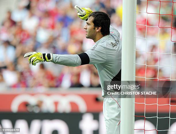 Porto Alegre's goalkeeper Muriel gestures during their Audi Cup football match FC Barcelona vs SC International de Porto Alegre in Munich, southern...