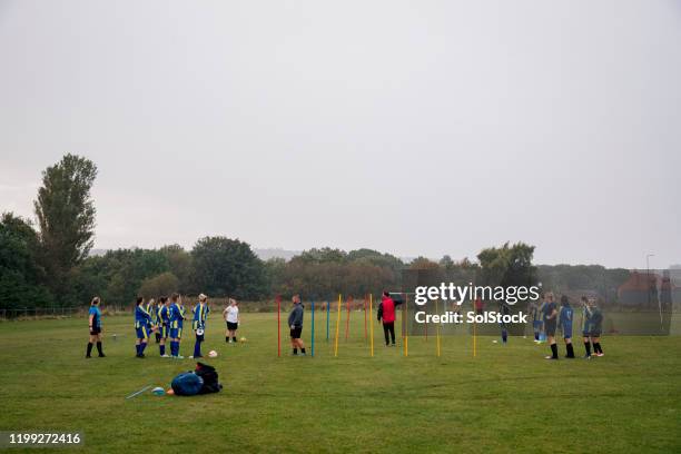 afternoon football training - wide shot stock pictures, royalty-free photos & images