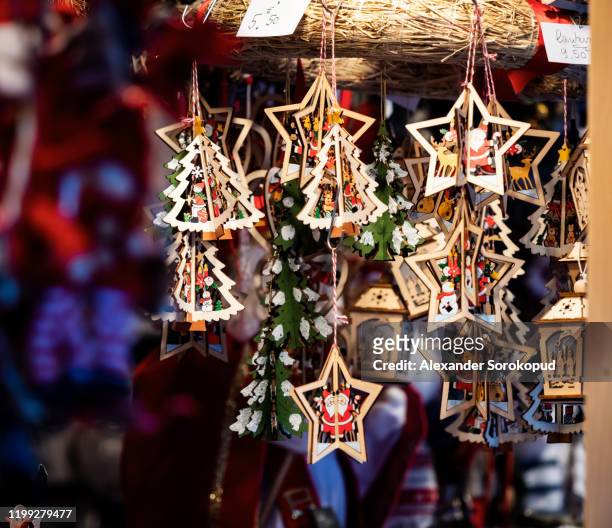 beautiful souvenirs at the christmas market in the capital of christmas - strasbourg - strasbourg winter stock pictures, royalty-free photos & images