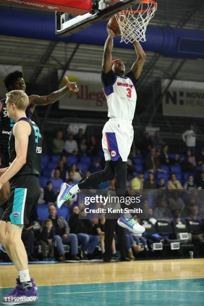 Craig Sword of the Grand Rapids Drive dunks against Thomas Welsh of the Greensboro Swarm in Greensboro, North Carolina. NOTE TO USER: User expressly...