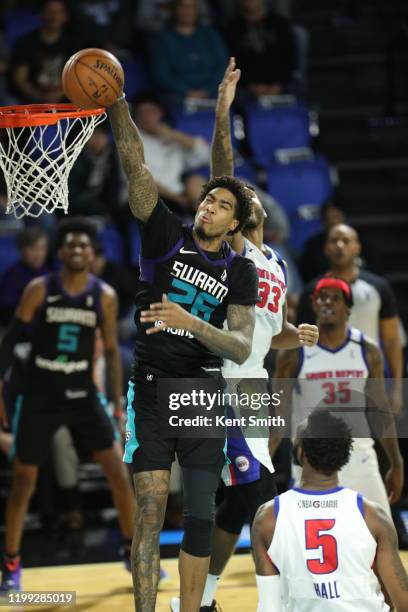 Ray Spalding of the Greensboro Swarm drives to the basket against Donta Hall of the Grand Rapids Drive in Greensboro, North Carolina. NOTE TO USER:...