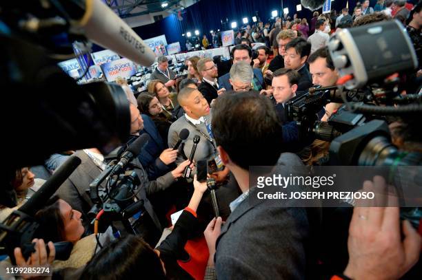 Symone Sanders, senior advisor to Joe Biden's presidential campaign, speaks to the media the spin room after the eighth Democratic primary debate of...