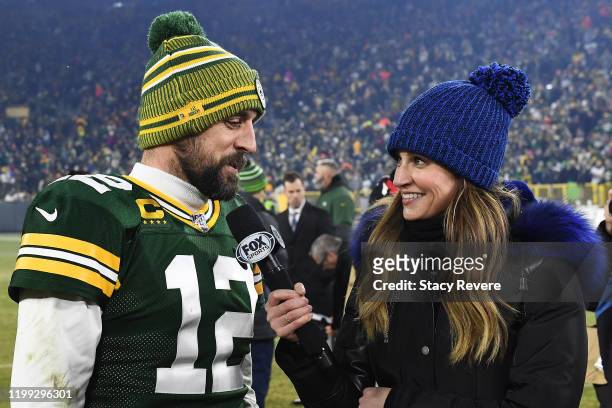 Aaron Rodgers of the Green Bay Packers speaks with Erin Andrews following a victory over the Seattle Seahawks in the NFC Divisional Playoff game at...