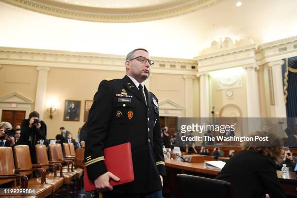 National Security Council Europe expert Lt. Col. Alexander S. Vindman leaves after appearing along with aide to Vice President Mike Pence, Jennifer...