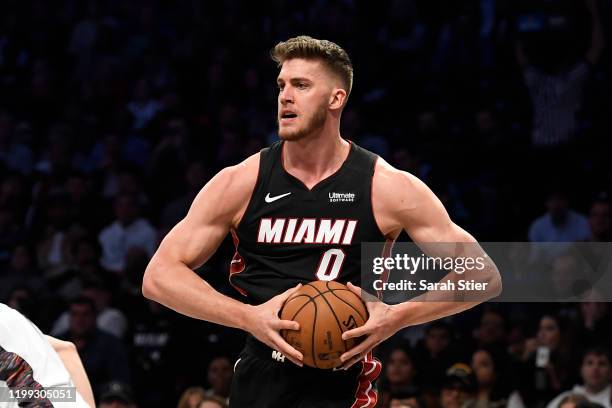 Meyers Leonard of the Miami Heat looks to pass during the first half of the game against the Brooklyn Nets at Barclays Center on January 10, 2020 in...