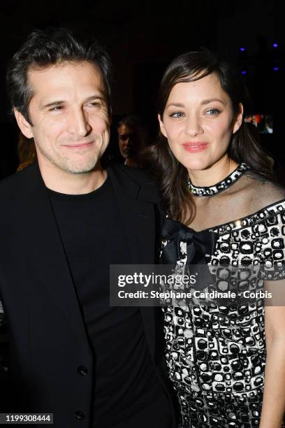 Guillaume Canet and Marion Cotillard attend the "Cesar - Revelations 2020" Photocall at Petit Palais on January 13, 2020 in Paris, France.