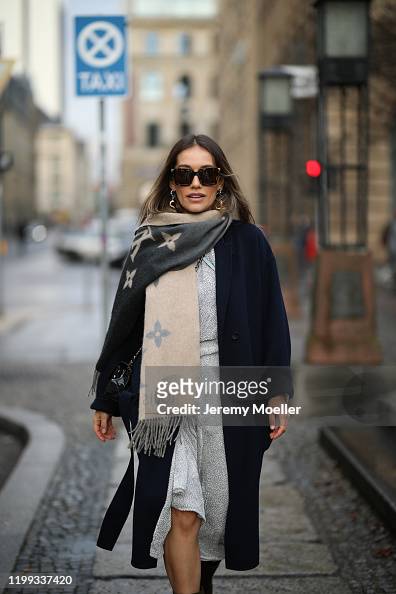 Anna Schürrle wearing Louis Vuitton scarf, Balenciaga earring and