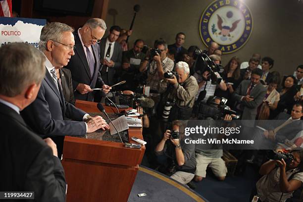 Senate Majority Leader Harry Reid answers reporters' questions during a news conference about the federal debt limit crisis at the U.S. Capitol July...