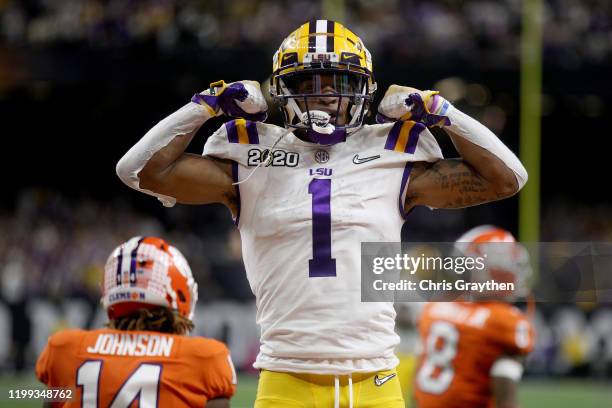 Ja'Marr Chase of the LSU Tigers reacts to a touchdown during the first half against the Clemson Tigers in the College Football Playoff National...