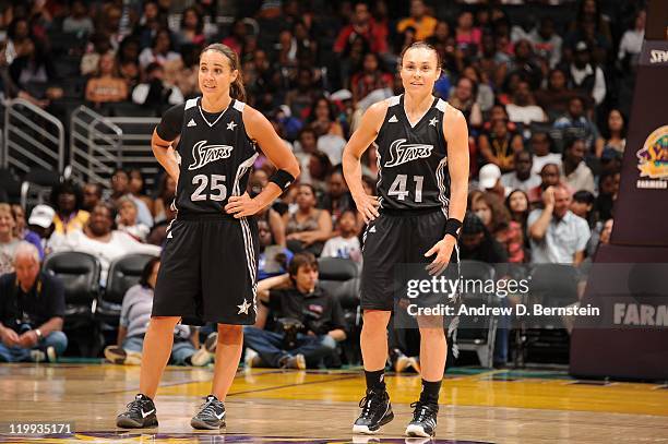 Becky Hammon and Tully Bevilaqua of the San Antonio Super Stars during the game against the Los Angeles Sparks at Staples Center on July 18, 2011 in...