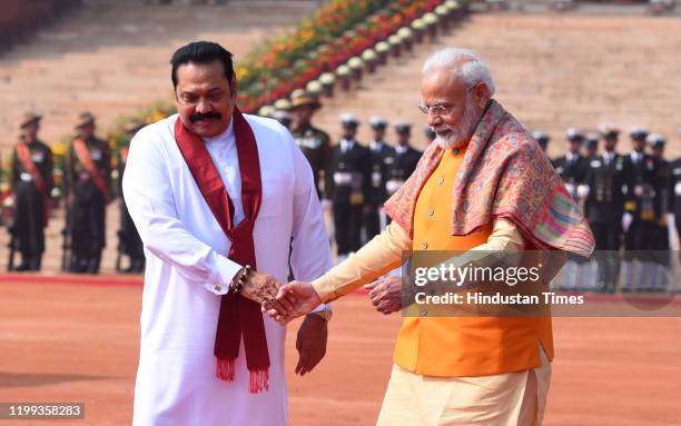 Prime Minister Narendra Modi with his Sri Lanka counterpart Mahinda Rajapaksa during his ceremonial reception, at Rashtrapati Bhawan, on February 8,...