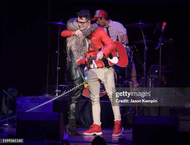 Lindsay Ell and Bobby Bones perform at the 5th Annual Million Dollar Show at Ryman Auditorium on January 13, 2020 in Nashville, Tennessee.