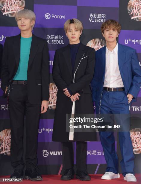 Jimin, J-Hope of Bangtan Boys arrive at the photocall for the 34th Golden Disc Awards on January 05, 2020 in Seoul, South Korea.