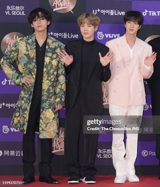 Kim Tae-Hyung, Suga, Kim Seok-Jin of Bangtan Boys arrive at the photocall for the 34th Golden Disc Awards on January 05, 2020 in Seoul, South Korea.