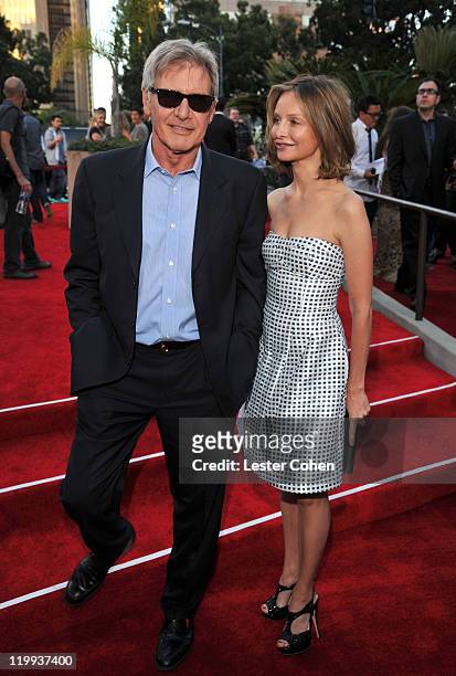Actors Harrison Ford and Calista Flockhart arrive at the "Cowboys & Aliens" World Premiere at San Diego Civic Theatre on July 23, 2011 in San Diego,...