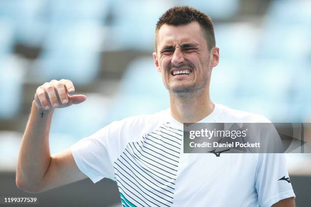 Bernard Tomic of Australia reacts in his match against Denis Kudla of the USA during 2020 Australian Open Qualifying at Melbourne Park on January 14,...