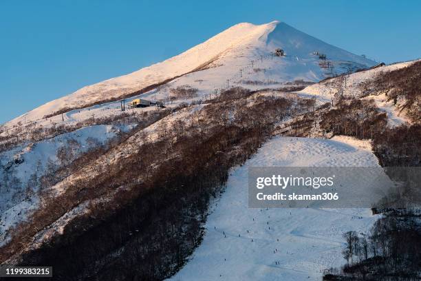 beautiful landscape view of little fuji mountain yotei  cover by snow and village near niseko hokkaido japan 2020 - mount yotei bildbanksfoton och bilder