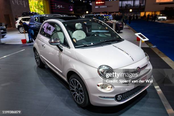 500c compact hatchback car on display at Brussels Expo on January 9, 2020 in Brussels, Belgium. The FIAT 500 C is fitted with a canvas roof that...