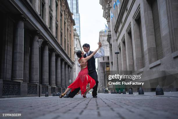 passionate tango partners, performing tango argentino - buenos aires tango stock pictures, royalty-free photos & images