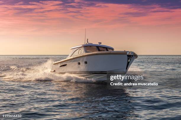 luxury motor boat - speed boat stock pictures, royalty-free photos & images