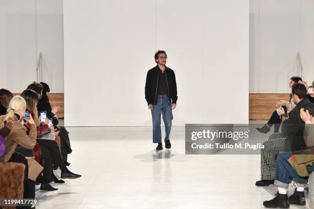 Fashion designer Marco De Vincenzo acknowledges the applause of the audience at the Marco De Vincenzo fashion show on January 14, 2020 in Milan,...