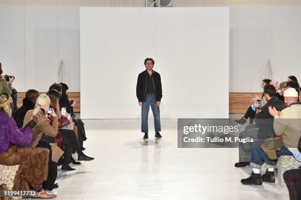 Fashion designer Marco De Vincenzo acknowledges the applause of the audience at the Marco De Vincenzo fashion show on January 14, 2020 in Milan,...