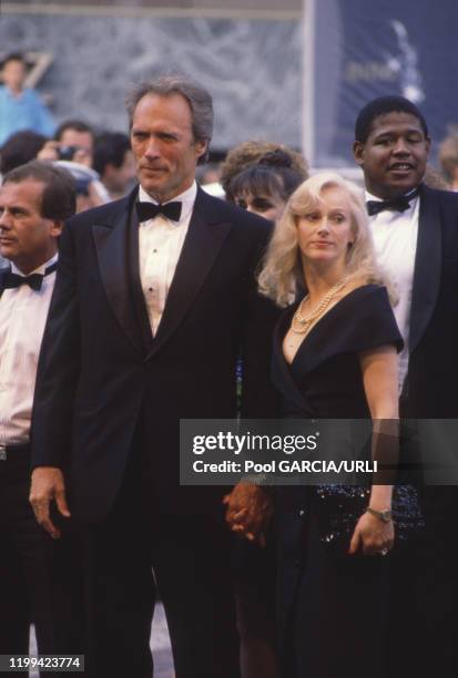 Clint Eastwood et sa compagne Sondra Locke lors du Festival de Cannes en mai 1988, France.