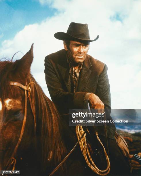Henry Fonda , US actor, on horseback in a publicity still issued for the film, 'Firecreek', 1968. The western, directed by Vincent McEveety, starred...
